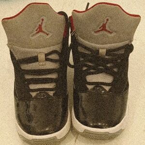 Jordan Black and Gray High-Top Sneakers with Iconic Jumpman